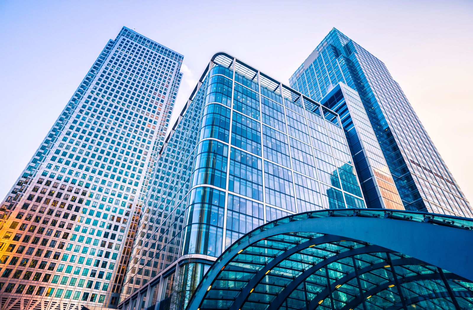 Modern glass office building representing the organizations Grandman Ventures serves